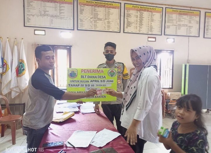 Polsek Cimarga Polres Lebak Pengamanan dan Monitoring Penyaluran BLT-DD di  Desa  Mekarjaya