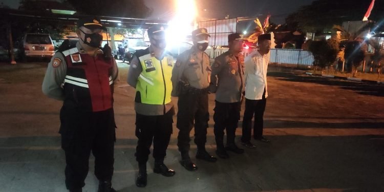 Personel Polsek Cilegon beserta Bhabinkamtibmas Polsek Cilegon Kota  laksanakan pengamanan Kegiatan Musabaqoh Tilawatil Quran.