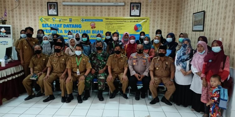 Kapolsek Cikeusal AKP Humaedi.SH.Melaksanakan Giat Sosialisasi BIAN di Aula Puskesmas Cikeusal