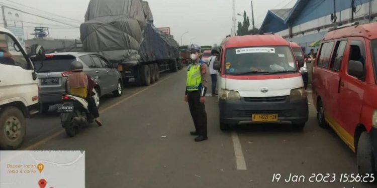 Polsek Cikande Gelar Strong Point Sore, Tempatkan Personel di Beberapa Lokasi Rawan Macet