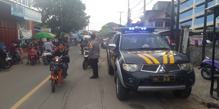 Menjaga Kamtibmas, Anggota Polsek Wanasalam Polres Lebak Laksanakan Strong Point Sore Hari, Layani Warga Yang Akan Ngabuburit