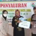 Bhabinkamtibmas Polsek Jawilan Polres Serang Kawal Pembagian BLT DD