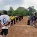 Anggota piket Polsek warunggunung, Polres Lebak PAM Turnamen Sepak Bola Antar RT Desa Pasir Tangkil