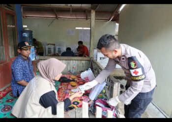Siedokes Polres Pandeglang Periksa Kesehatan Personel Pengamanan TPS di Lokasi PPS Pasca Pemungutan Suara telah di laksanakan