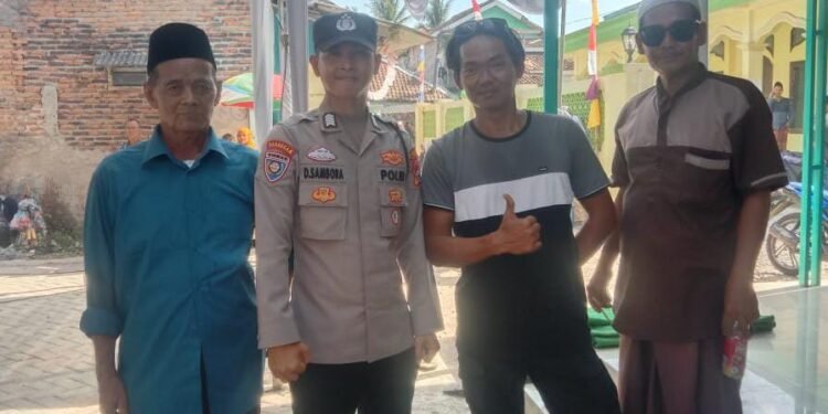 Bhabinkamtibmas Polsek Cimarga Polres Lebak  Edukasi Warga Untuk Wujudkan Pemilu Damai